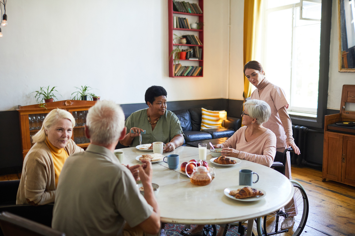 diverse group of senior people in assisted living