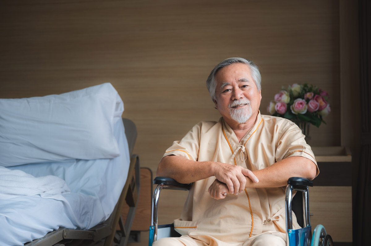 elderly male patients in hospital room