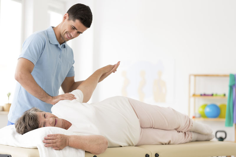senior rehabilitation with physical therapist